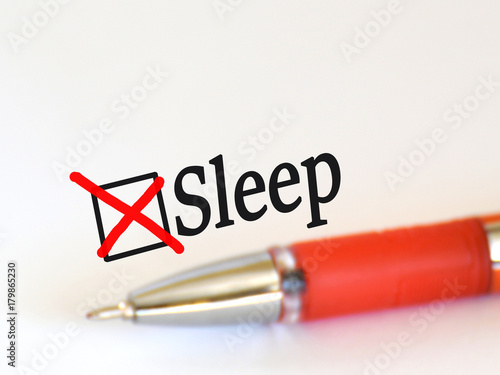 Questionnaire. Red pen and the inscription  sleep  with cross on the white paper