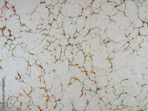 Marbled paper background.