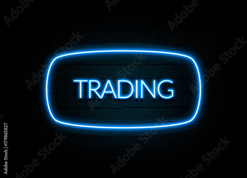 Trading - colorful Neon Sign on brickwall