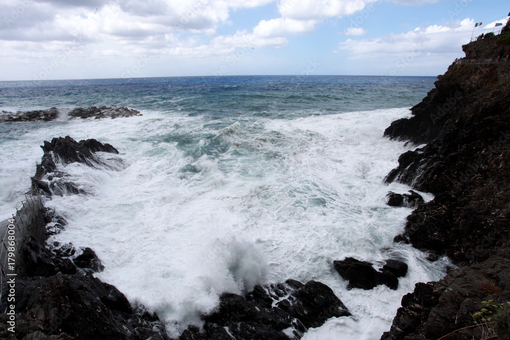 waves crashing on the rocky coast e