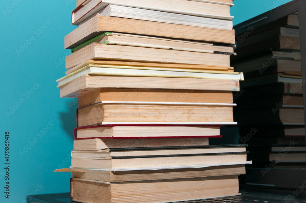 A bunch of books on the laptop. A bunch of books on the laptop.