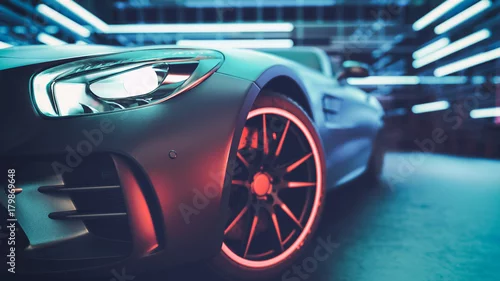 Obraz Nowoczesne samochody są w pokoju studio.