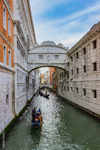 Bridge of Sighs, Venice. View of the famous Bridge of Sighs in Venice. Gondola on small canal passing towards famous Bridge of Sighs (Ponte dei Sospiri) in Venice, Italy.