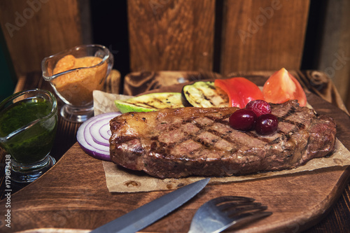 grilled beef steak with sau...