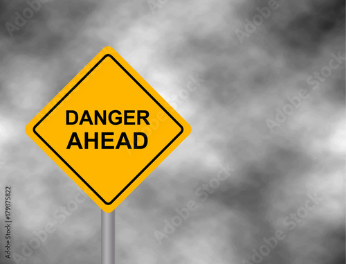Yellow road sign as a warning of Danger Ahead. Background of dark grey sky with cumulus clouds and yellow banner. Vector illustration..
