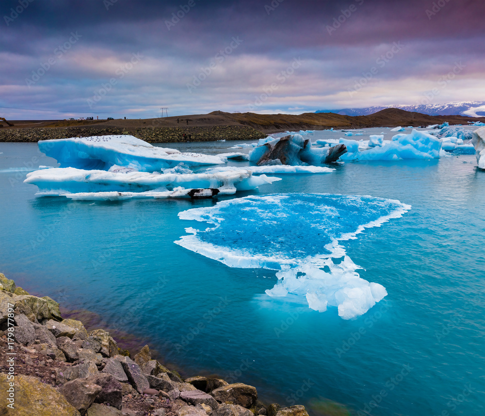 Blue icebergs floating in Jokulsarlon glacial lagoon.