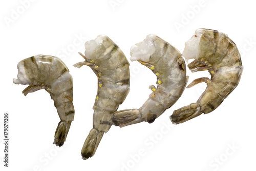 Fresh and wet raw tiger shrimps (tiger prawns) without heads and deveined ready for cooking, Isolated on white background with work path.