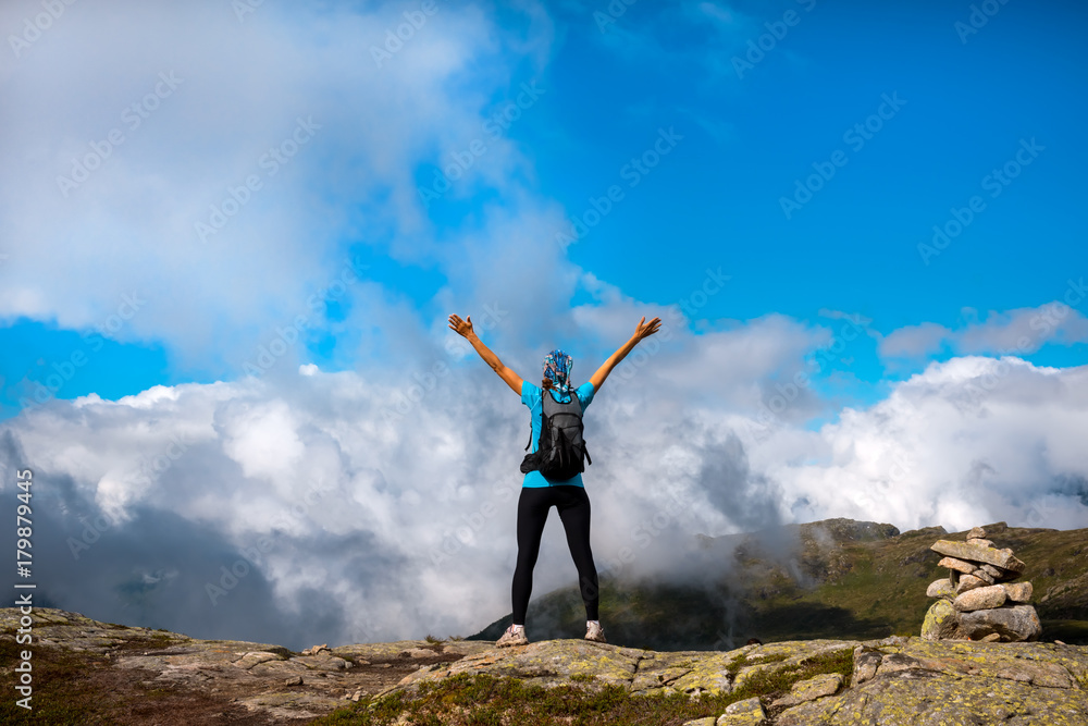 Happy woman enjoy lake and good weather in Norway Happy woman enjoy lake and good weather in Norway