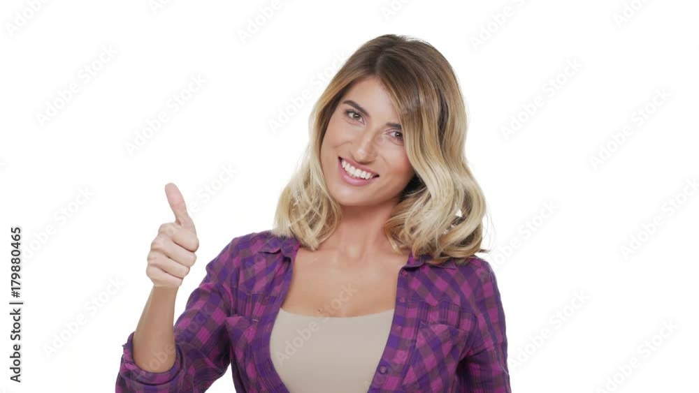 half-turn portrait of successful woman with long blond hair showing thumb up expressing everything is great over white background. Concept of emotions half-turn portrait of successful woman with long blond hair showing thumb up expressing everything is great over white background. Concept of emotions