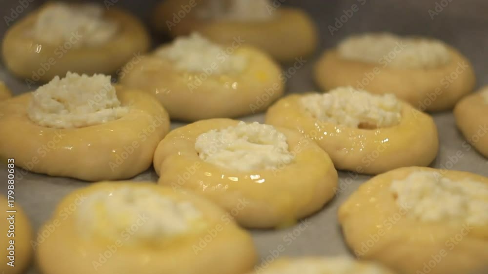 girl makes of buns on the table, hands, close-up girl makes of buns on the table, hands, close-up