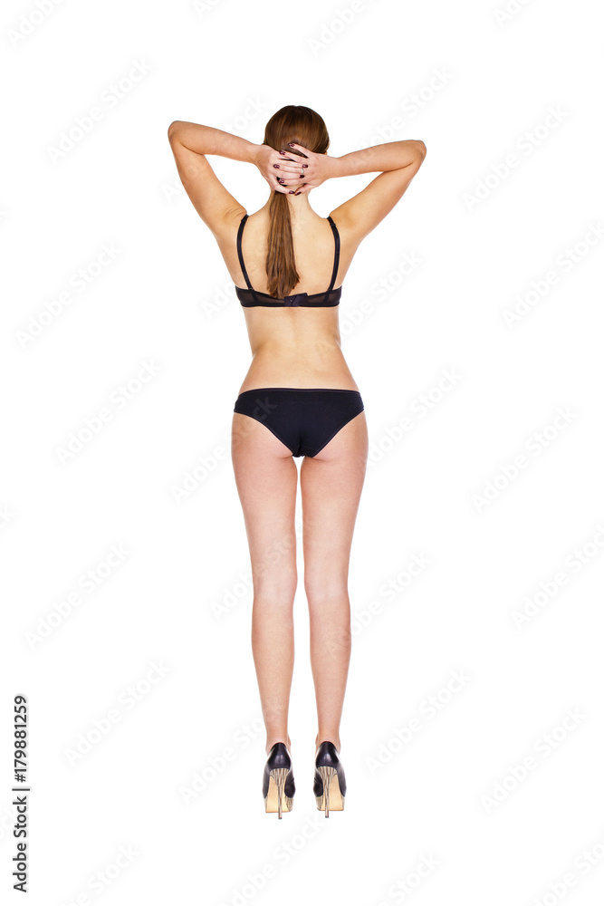 Full length portrait of young woman wearing black underwear Full length portrait of young woman wearing black underwear