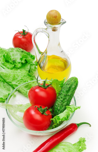 Fototapeta Naklejka Na Ścianę i Meble -  Set vegetable and jug of vegetable oil isolated on the white background