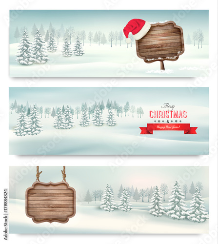 Holiday Christmas banners with winter landscare and wooden sign. Vector. photo