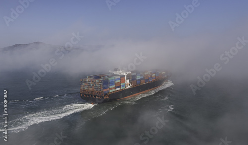 Cargo ship in the fog