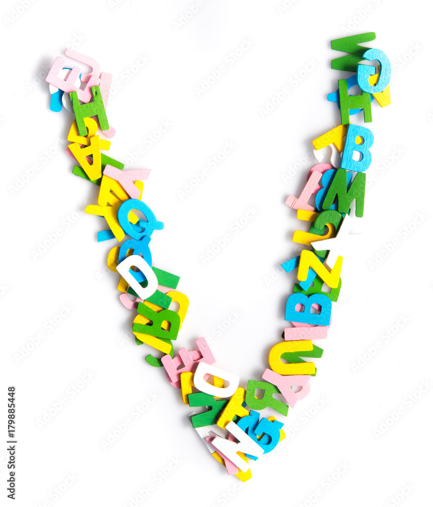 Colorful wood alphabet letters on a white background,font letter V