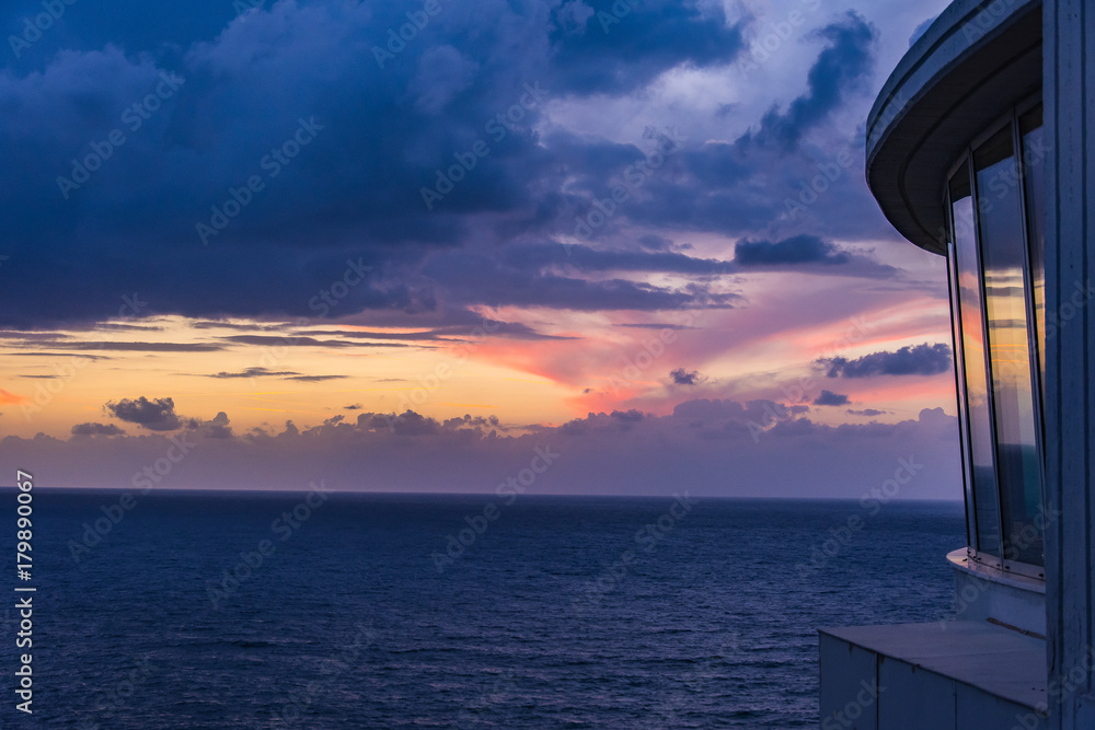 Picturesque view of beautiful cloudy sky at sunset on calm sea. Picturesque view of beautiful cloudy sky at sunset on calm sea.