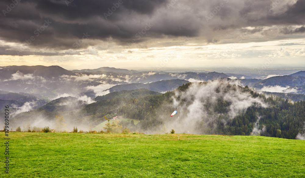 Dramatic sky at rainy day in Black Forest in Germany / Wide panoramic photo of Black Forest nearby Freudenstadt Dramatic sky at rainy day in Black Forest in Germany / Wide panoramic photo of Black Forest nearby Freudenstadt