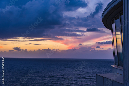 Picturesque view of beautiful cloudy sky at sunset on calm sea. 