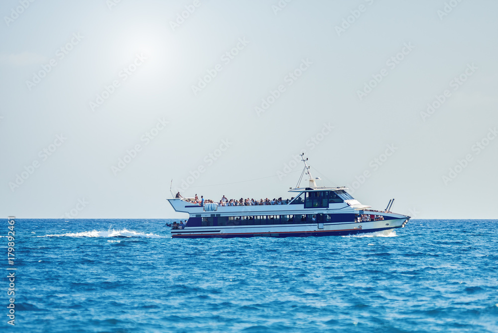 Touristic ship sailing in sea. Touristic ship sailing in sea.