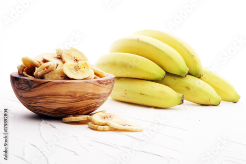 dried banana on white background.Homemade Dehydrated Banana Chips.