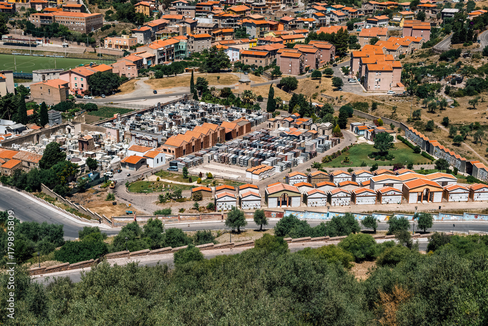 Bosa, Sardinia, Italy - June 15, 2017: Cemetery of seen from the old castle of Malaspina. Bosa, Sardinia, Italy - June 15, 2017: Cemetery of seen from the old castle of Malaspina.