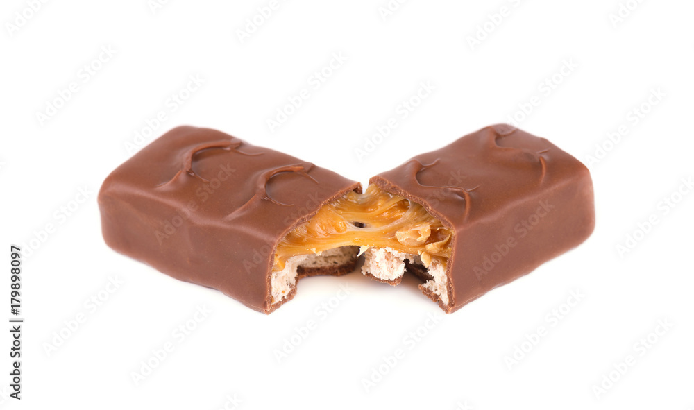 Closeup of chocolate,peanut and caramel bar isolated on white background, with clipping path Closeup of chocolate,peanut and caramel bar isolated on white background, with clipping path