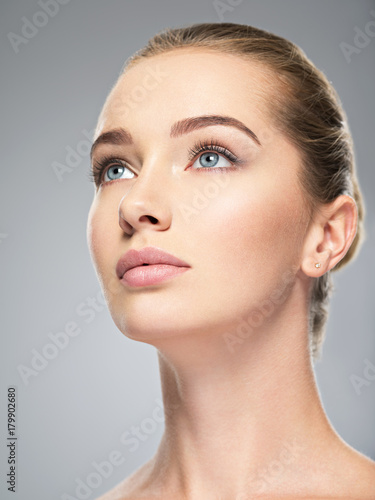 Beautiful face of young woman with perfect skin