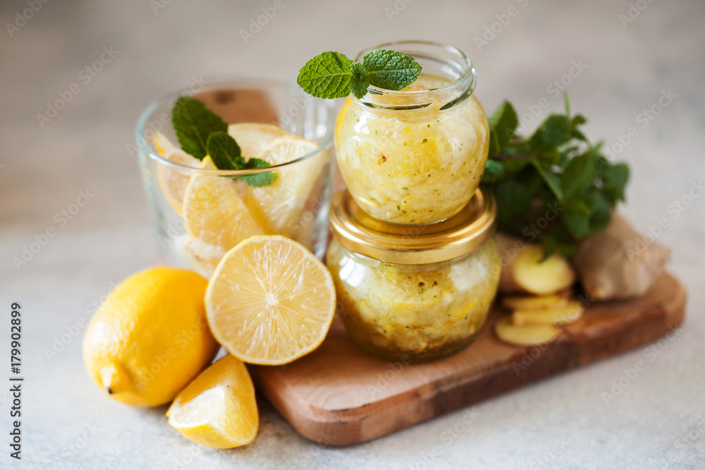 Homemade lemon, ginger and mint jam. Natural medicine, healthy food top view Homemade lemon, ginger and mint jam. Natural medicine, healthy food top view