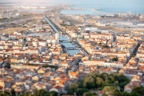 Aerial cityscape view on Sete village during the sunset in Occitanie region in southern France photo