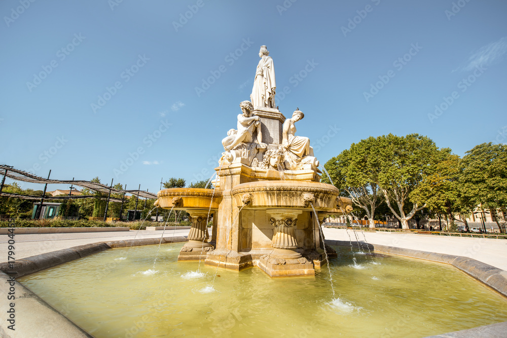 View on the Charles Gaulle fountain in Nimes city during the sunny morning in the Occitanie region of southern France