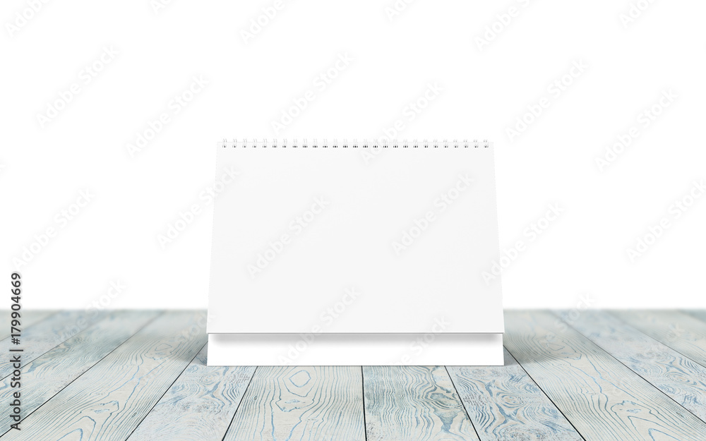 Blank desk calendar on wooden desk. Front view. Mockup template to replace your design. Blank desk calendar on wooden desk. Front view. Mockup template to replace your design.