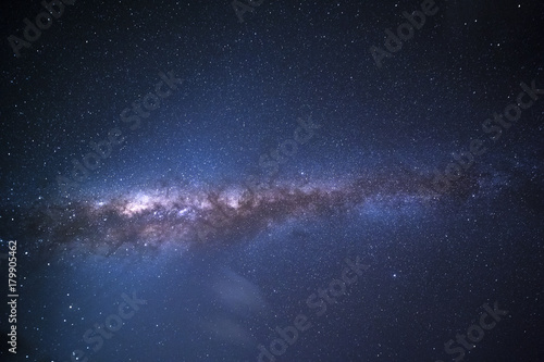 Naklejka The Milky Way is our galaxy. This long exposure astronomical photograph of the nebula Cygnus is taken in the middle of the night in Zanzibar Tanzania.