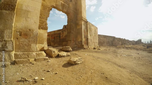 antique arched large gate entrance to an ancient fortress, ruins