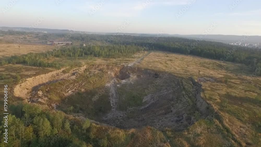 Aerial view of huge landslide near mining of potassium ore, deep hole in soil, Stebnyk, Truskavets, Ukraine