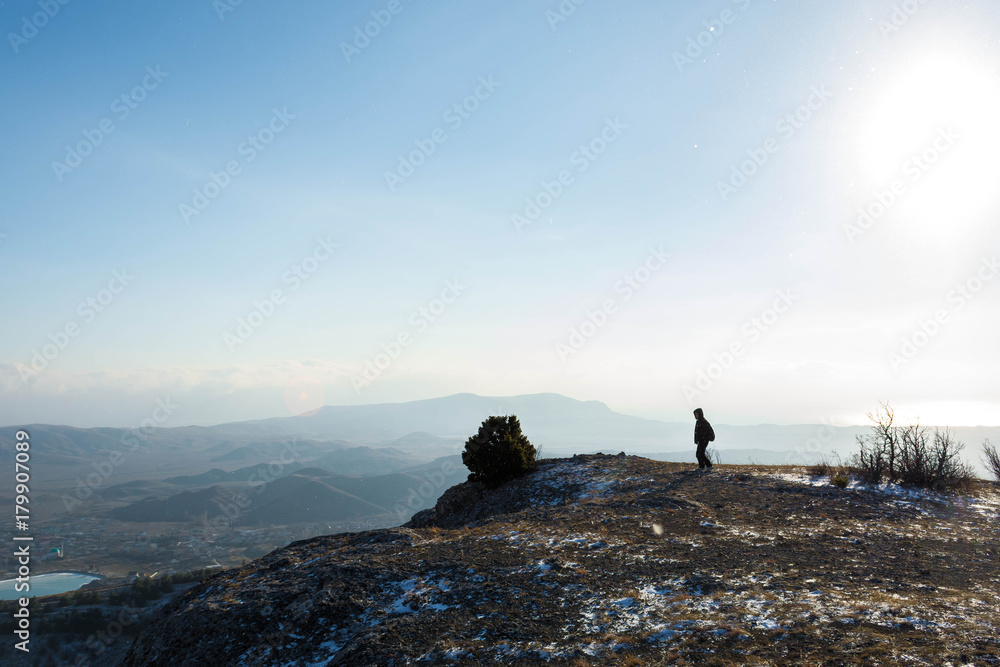 Man in the mountains in winter