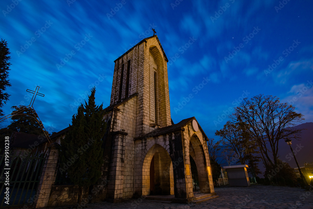 ancient stone church of sapa with blue night sky most popular traveling destination in sapa norhtern of vietnam