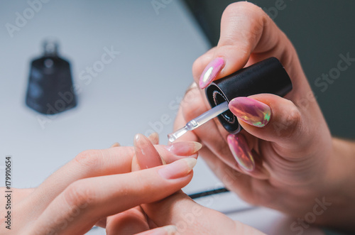 Professional manicure procedure. Beauty salon