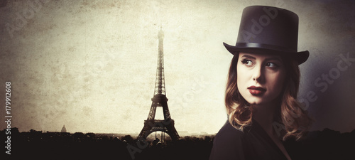 Vászonkép Style and mystique redhead girl in top hat