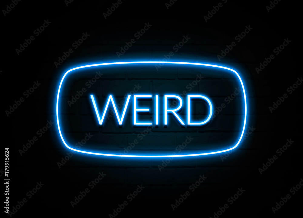 Weird - colorful Neon Sign on brickwall Weird - colorful Neon Sign on brickwall
