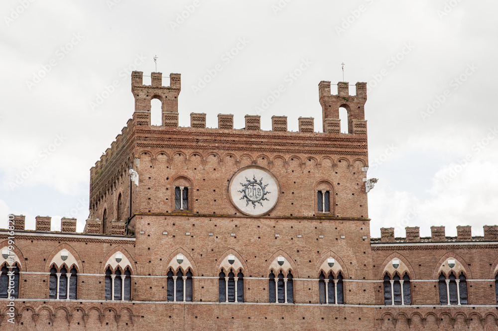 Siena, Italy.. The historic centre of Siena has been declared by UNESCO a World Heritage Site.  Siena is famous for its cuisine, art, museums, medieval cityscape and the Palio, a horse race