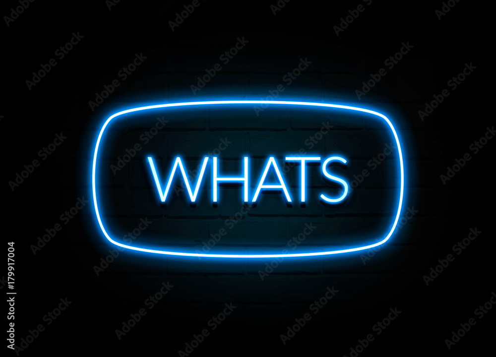 Whats - colorful Neon Sign on brickwall Whats - colorful Neon Sign on brickwall
