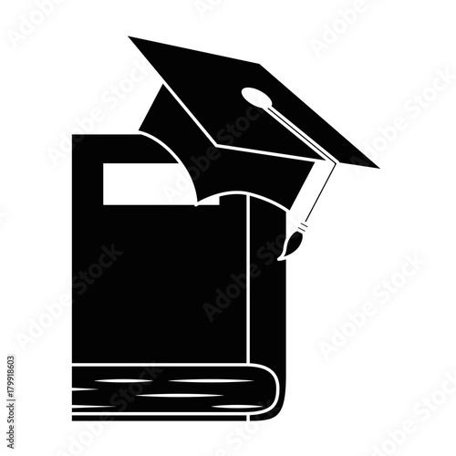 text book with hat graduation