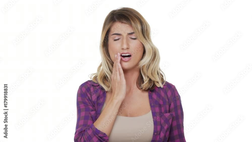 portrait of adult pretty lady with long hair suffering from toothache touching cheek expressing pain on face over white background in studio. Concept of emotions portrait of adult pretty lady with long hair suffering from toothache touching cheek expressing pain on face over white background in studio. Concept of emotions