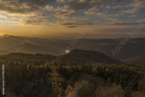 Sunset evening on Varhost hill in Ceske Stredohori mountains