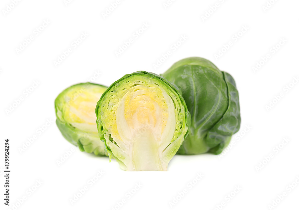 Fototapeta premium Brussels sprouts isolated on a white background. Pile of Brussels sprouts