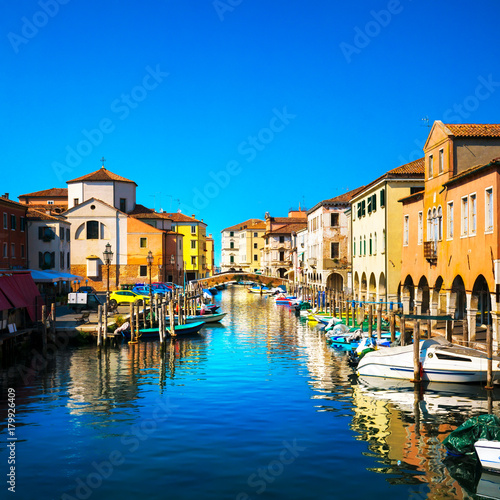 Chioggia town in venetian lagoon  water canal and church. Veneto  Italy