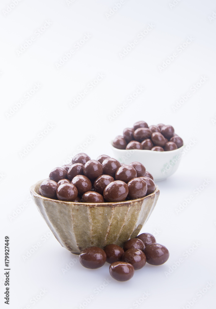chocolate balls. chocolate balls in bowl on a background chocolate balls. chocolate balls in bowl on a background