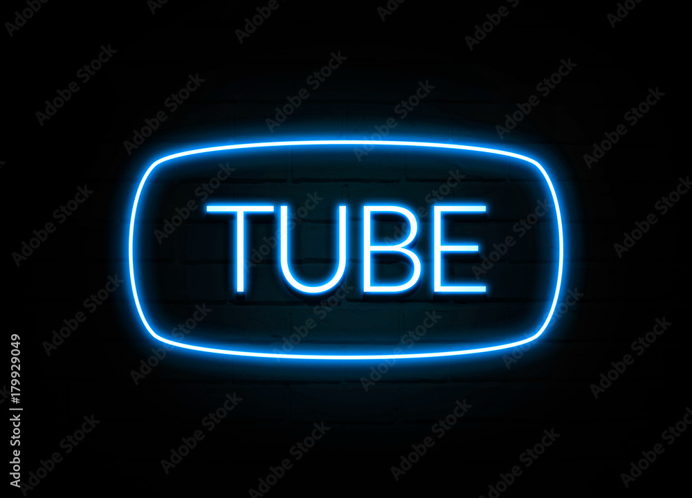 Tube - colorful Neon Sign on brickwall Tube - colorful Neon Sign on brickwall