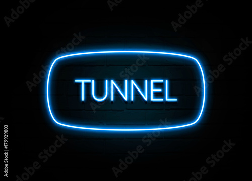 Tunnel - colorful Neon Sign on brickwall