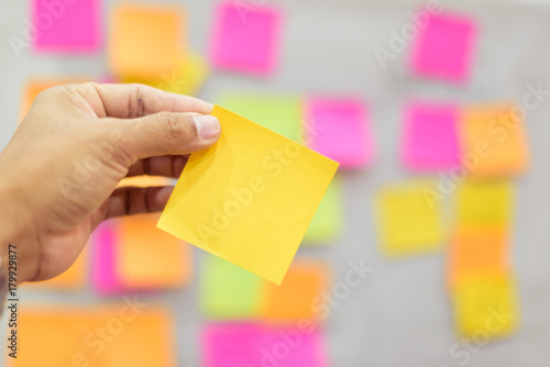 Принти на полотні Close up hand holding empty note sticky for brainstorm strategy workshop business